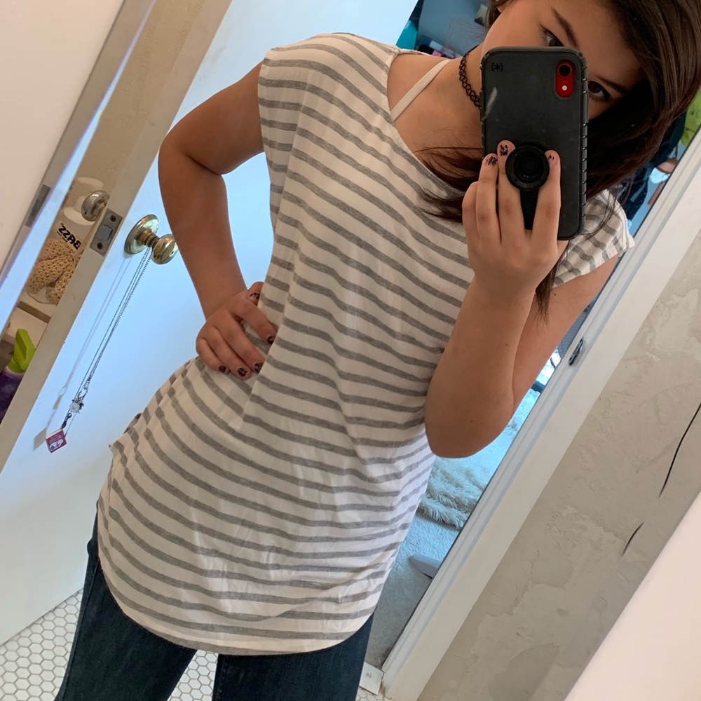 green envelope gray and white striped shirt